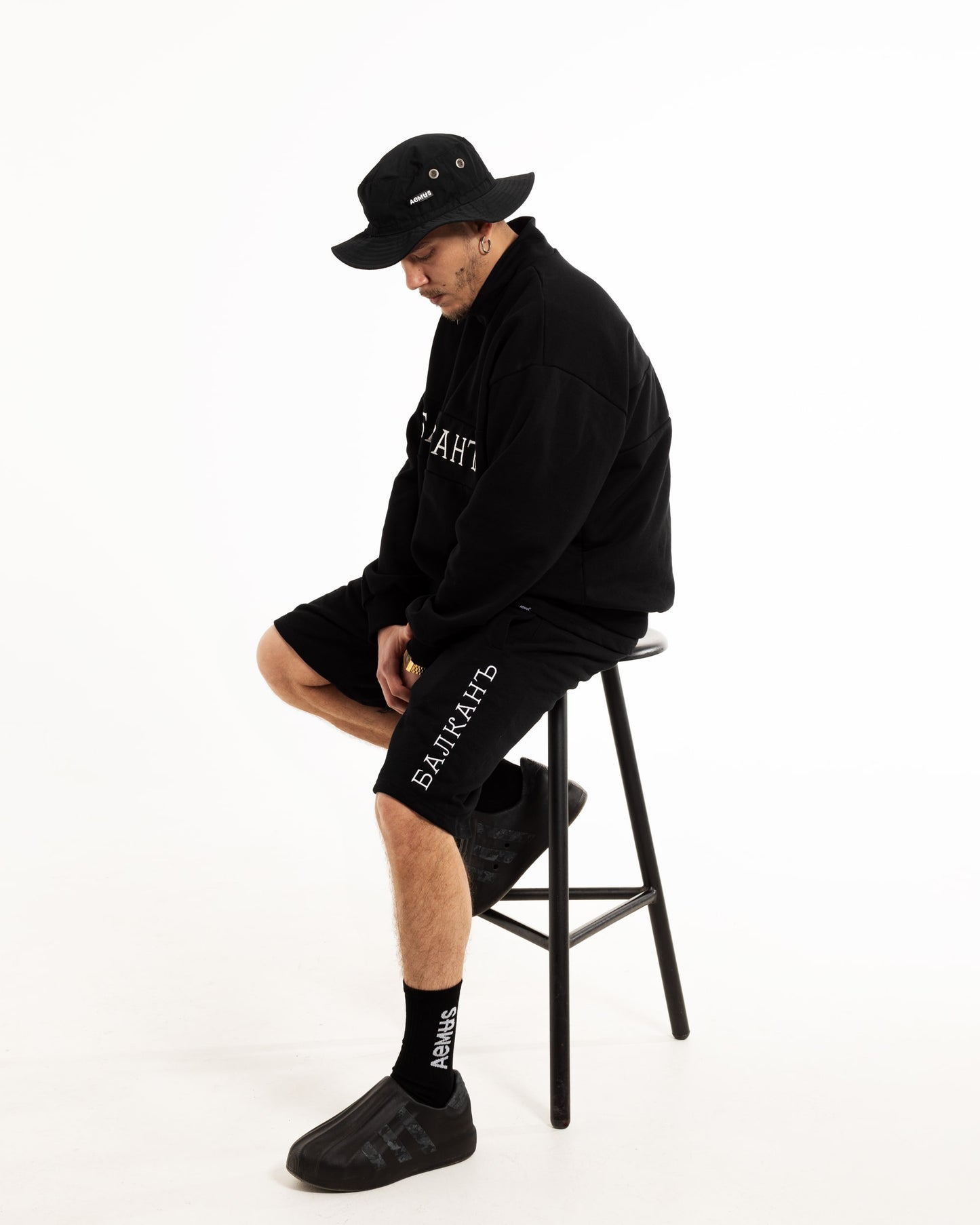 Aemus Black Quarter Zip Sweater