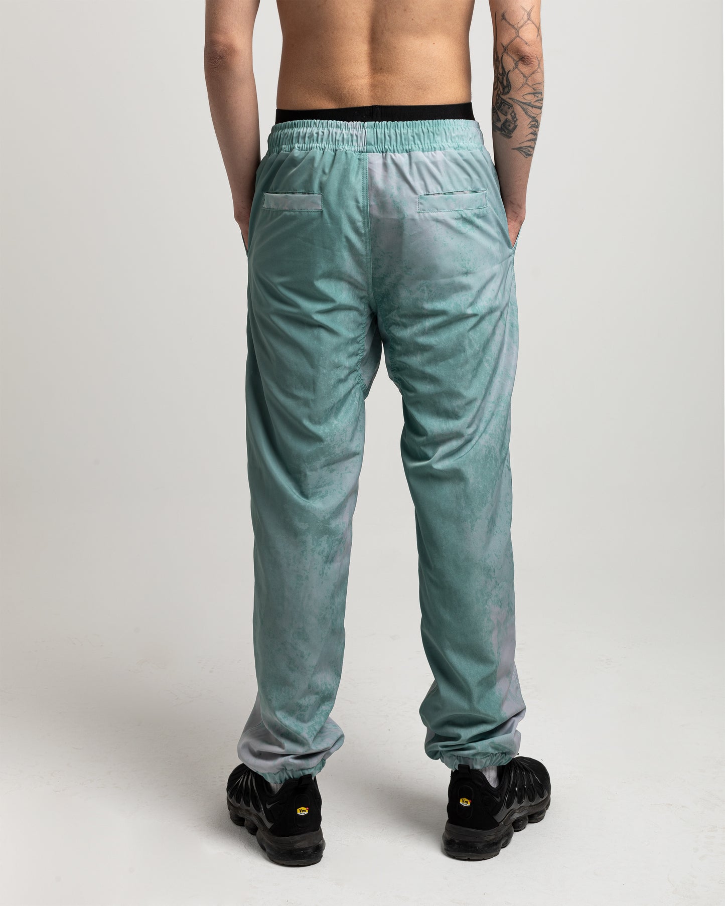 AEMUS CRYSTAL GREEN TRACK PANTS