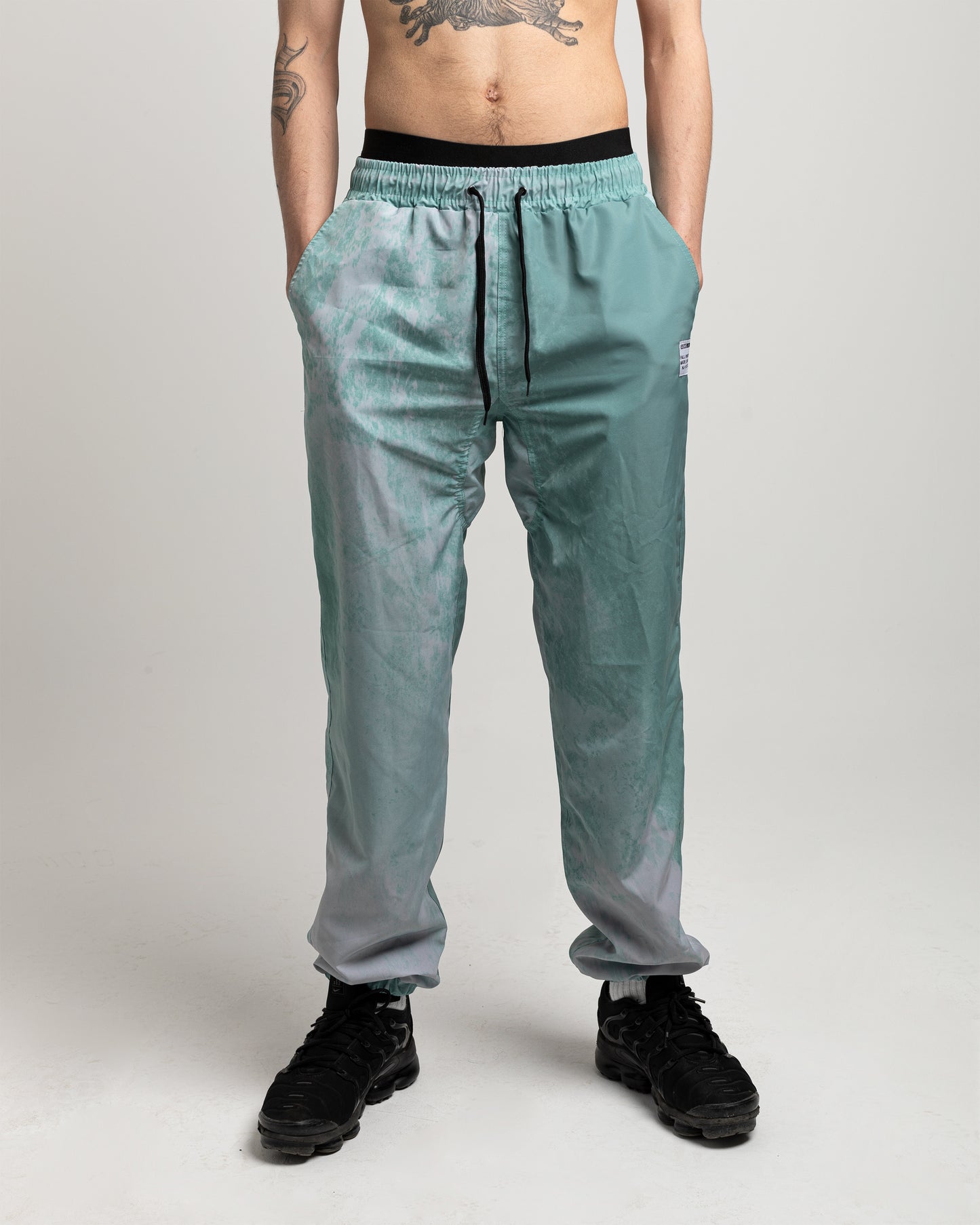 AEMUS CRYSTAL GREEN TRACK PANTS